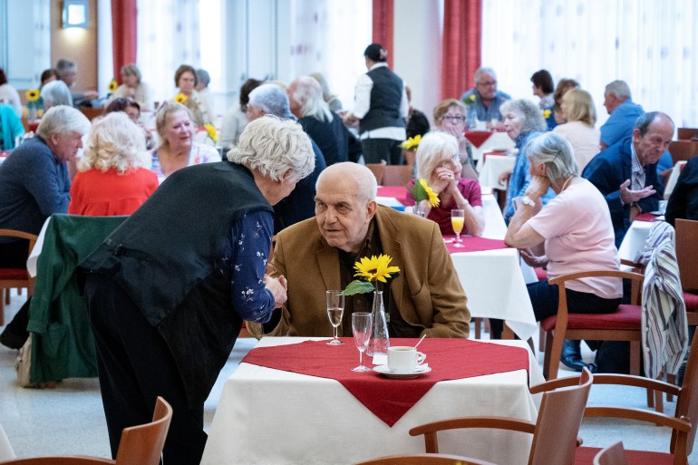 epa07949128 People participate in a speed dating for seniors event at a retirement home in Vienna, Austria, 03 October 2019 (issued 25 October 2019). Elisabeth Mueller, the inventor of speed dating for seniors in Vienna, organized various leisure-time activities for elder people and started with the first speed dating event on 07 September 2017. While working with pensioners she realized that more and more people were widowed and feel alone. At this point the idea about speed datings at retirement homes came up and since then they are held regularly with up to 260 attendees per event. A women majority exists at most of the events, lots of them do not search for a partner, they want to get in touch with others for leisure-time activities, like hiking or playing chess. Some other participants attend speed dating events to find love. After a few events Mueller's speed datings have gained the couple, Beatrix and Willi. Beatrix, 64 years old and Willi, 70 years old, have met at a speed dating event in 2018. Like a lot of participants, Beatrix and Willi were divorced before and had no intentions to find someone for a relationship. At the first event she exchanged three telephone numbers, met all of them and the third one was Willi, who took her out to dance. Willi visited another speed dating event before with a friend, again without intention for a relationship. He was her backup to escape way too old men. Willi exchanged six telephone numbers in total, he points out: 'To meet Beatrix must be destiny!' EPA-EFE/CHRISTIAN BRUNA ATTENTION: This Image is part of a PHOTO SET