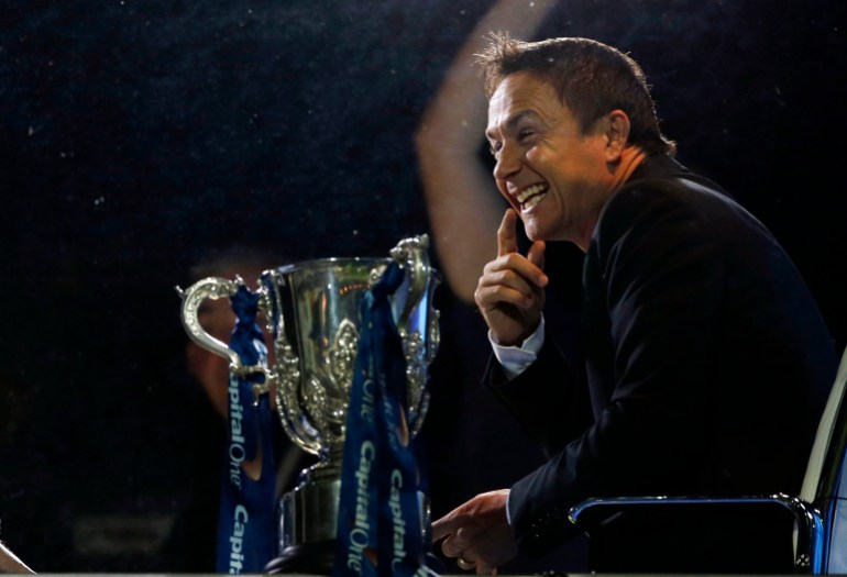 Football - Swindon Town v Chelsea - Capital One Cup Third Round - The County Ground - 24/9/13 Ex-Chelsea player Dennis Wise gestures towards the Chelsea supporters from the TV studio