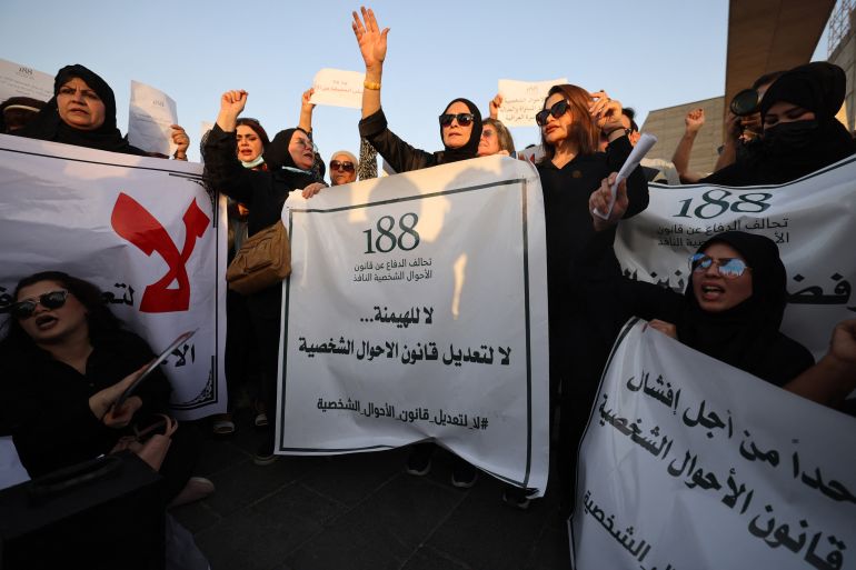 Iraqi women demonstrate against underage marriage in Tahrir Square in central Baghdad on August 8, 2024, amid parliamentary discussions over a proposed amendment to the Iraqi Personal Status Law. - Rights advocates are alarmed by a bill introduced to Iraq's parliament that, they fear, would roll back women's rights and increase underage marriage in the deeply patriarchal society. (Photo by AHMAD AL-RUBAYE / AFP)