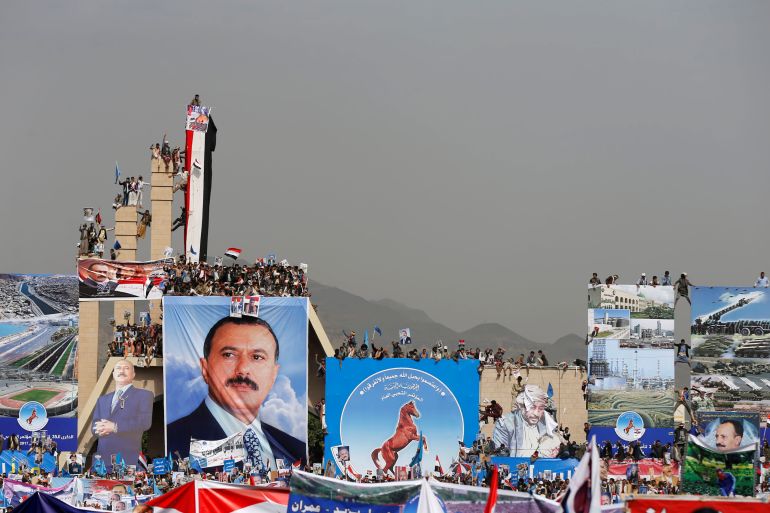 Supporters of Yemen's former President Ali Abdullah Saleh attend a rally to mark the 35th anniversary of the establishment of the General People's Congress party which is led by Saleh in Sanaa