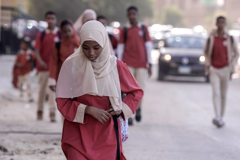 sudanese students, who mostly came to egypt after the war in sudan, walk to their school, in cairo, egypt, wednesday, april 17, 2024. sudan has been torn by the war for a year now, that has killed at least 14,600 people across sudan and created the world's largest displacement crisis, according to the un. more than 8 million people have been driven from their homes, fleeing either to safer areas inside sudan or to neighboring countries. (ap photo/amr nabil)