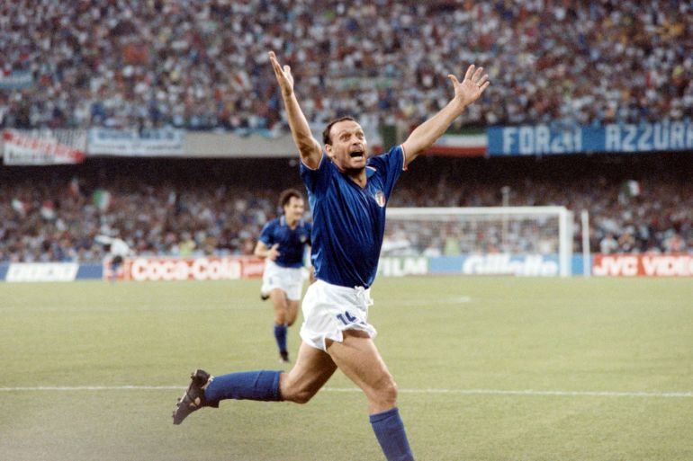 Italian forward Salvatore Schillaci exults after scoring his team's first goal during the World Cup semifinal soccer match between Italy and Argentina 03 July 1990 in Naples. Argentina and Italy played to a 1-1 tie but Argentina advanced to the finals with a 4-3 victory on penalty kicks dashing the hopes of Italian fans of a World Cup victory by their team on home soil. (Photo by DANIEL GARCIA / AFP)