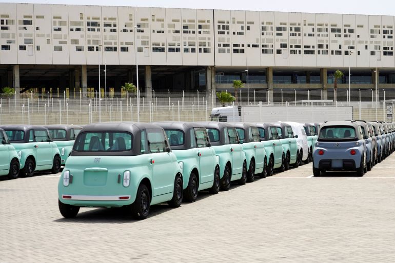 Fiat and Citroen electric vehicles wait to be exported at Tanger Med Port, on the Strait of Gibraltar, east of Tangier, Morocco June 6, 2024. REUTERS/Abdelhak Balhaki