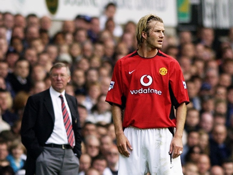 LONDON - APRIL 27: David Beckham of Manchester United and his manager Sir Alex Ferguson look in different directions during the FA Barclaycard Premiership match between Tottenham Hotspur and Manchester United held on April 27, 2003 at White Hart Lane, in London. Manchester United won the match 2-0. (Photo by Shaun Botterill/Getty Images)