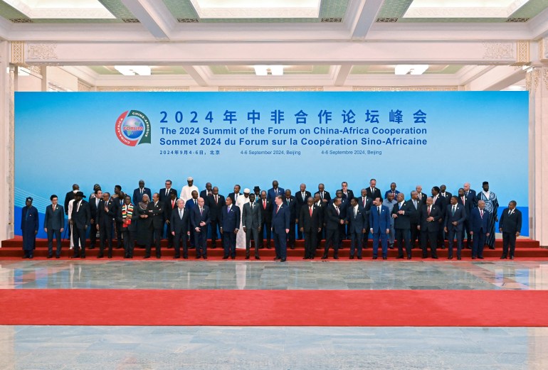 China’s President Xi Jinping and African leaders prepare to leave after having a group photo during the Forum on China-Africa Cooperation (FOCAC) summit at the Great Hall of the People in Beijing, China September 5, 2024. ADEK BERRY/Pool via REUTERS REFILE - QUALITY REPEAT