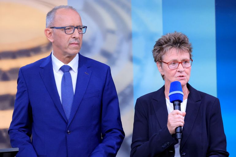 Alternative for Germany (AfD) party top candidate Joerg Urban and "Buendnis Sahra Wagenknecht" (BSW) party top candidate Sabine Zimmermann attend a TV interview after first exit polls in the Saxony state election, in Dresden, Germany, September 1, 2024. REUTERS/Lisi Niesner