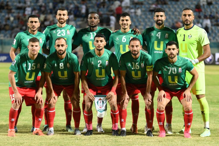 Starting members of Kuwait's Al Kuwait SC pose prior to the AFC Cup 2023/24 soccer match between Al Kuwait SC and Al Wehdat SC in Kuwait, Kuwait City, on 03 October 2023. (Photo by Noufal Ibrahim/NurPhoto via Getty Images)