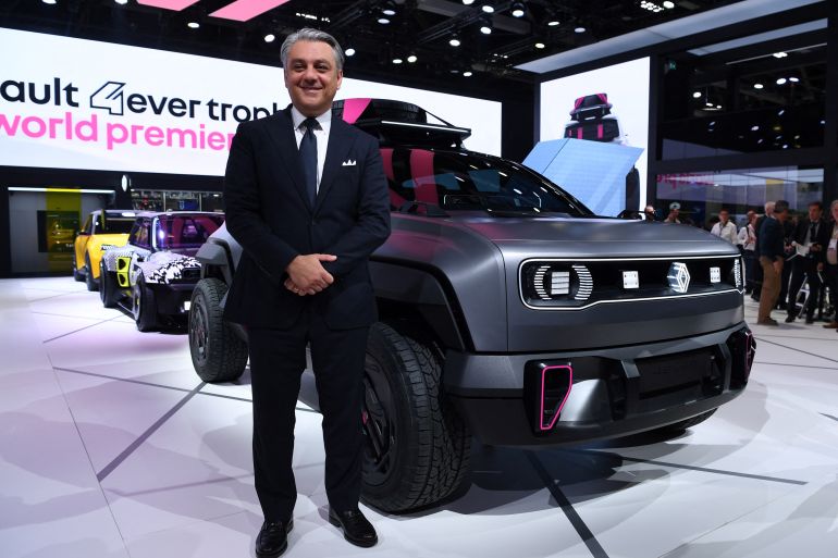 Renault Group CEO Luca de Meo presents the Renault 4 Ever Trophy on the first day of the Paris auto show on October 17, 2022. (Photo by Eric PIERMONT / AFP)