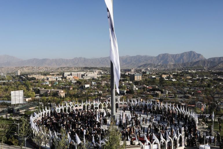 taliban members attend the taliban flag-raising ceremony in kabul, afghanistan, march 31, 2022. reuters/ali khara