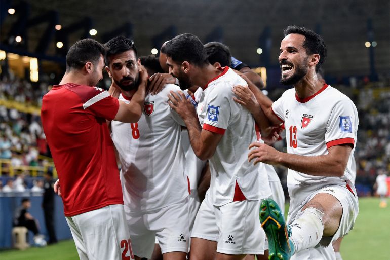 Soccer Football - World Cup - AFC Asian Qualifiers - Group G - Saudi Arabia v Jordan - Al-Awwal Stadium, Riyadh, Saudi Arabia - June 11, 2024 Jordan's Noor Al Rawabdeh celebrates scoring their second goal with teammates REUTERS/Stringer