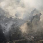 Israel’s deadliest strike in central Beirut leaves Lebanese stunned as they dig through the rubble