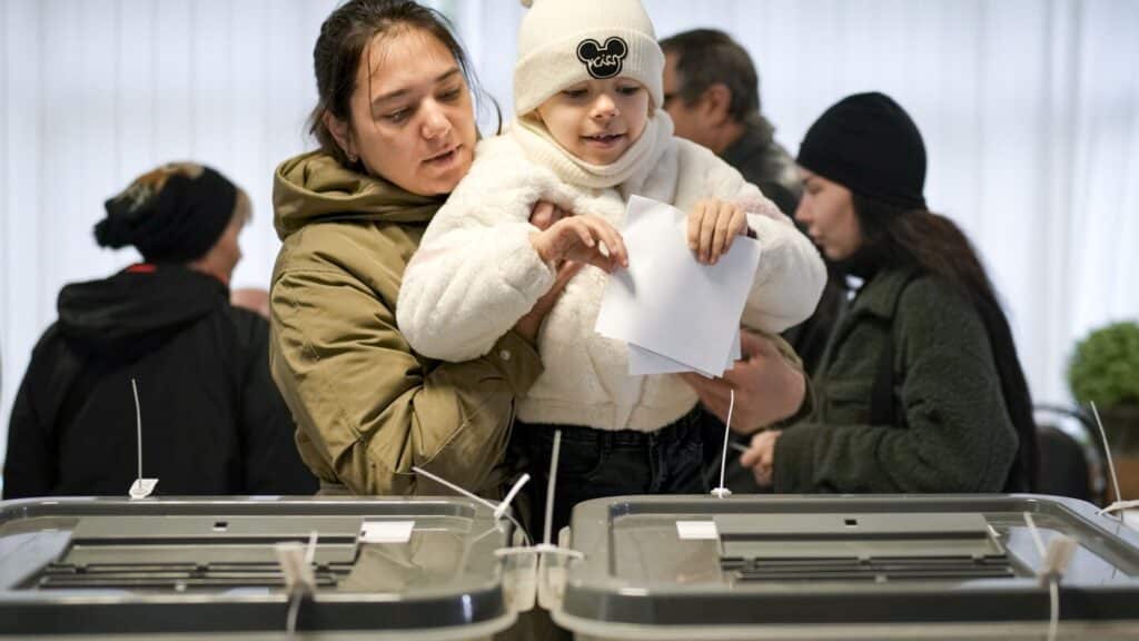 Moldovans cast votes to choose president and decide on EU path as Russian interference claims spike