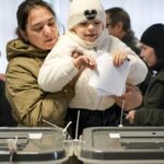 Moldovans cast votes to choose president and decide on EU path as Russian interference claims spike