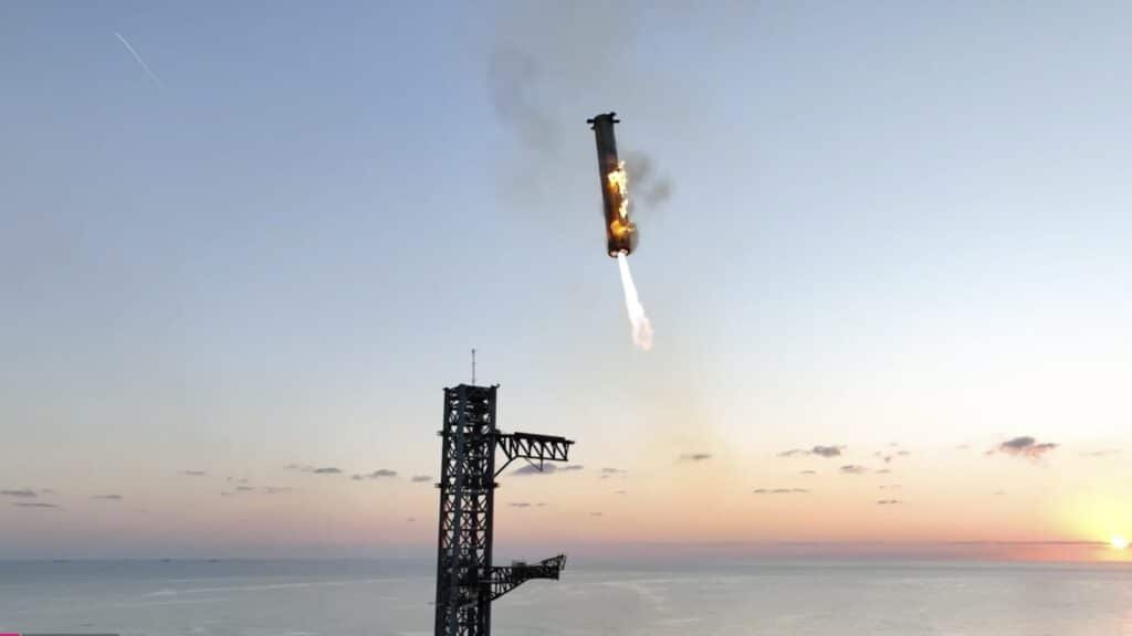 In an engineering feat, mechanical SpaceX arms catch Starship rocket booster back at the launch pad