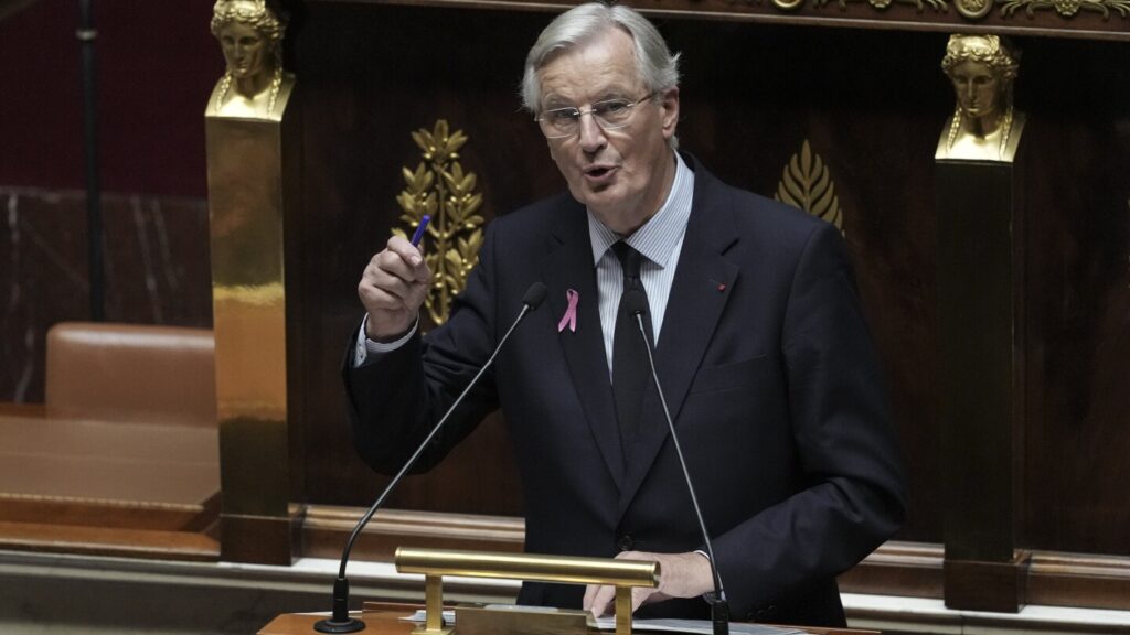 France’s prime minister vows to curb debt as he faced baptism of fire at heckled parliament