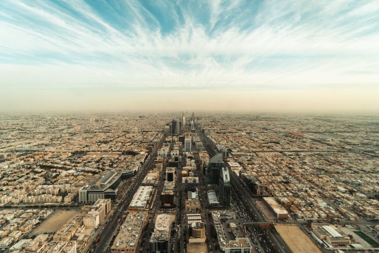 dramatic aerial view of riyadh downtown and business district in saudi arabia capital city.